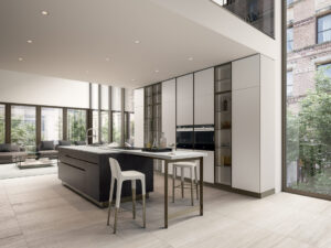 Cuisine Ri-flex en bois foncé avec ilot central, conçue pour optimiser l’espace et la collaboration familiale